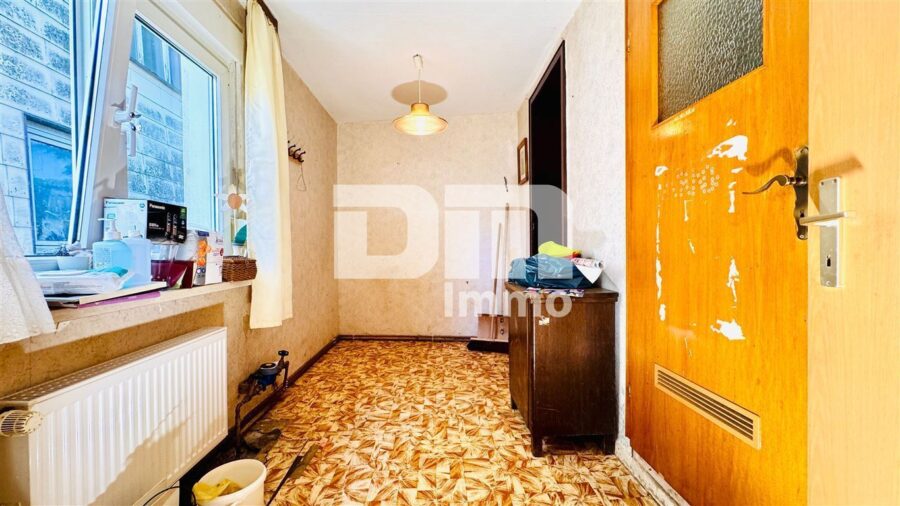 2 Einfamilienhäuser in gesuchter Wohnlage mit viel Potenzial zum Paketpreis - Haus massiv Durchgangszimmer